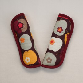 Stroller harness shoulder pads ,apples print on a brown