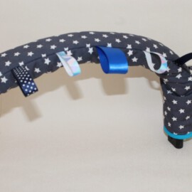Bumper bar cover with tags ,stars print on a dark gray