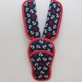 Shoulder pads & crotch cover,  anchors on a navy background