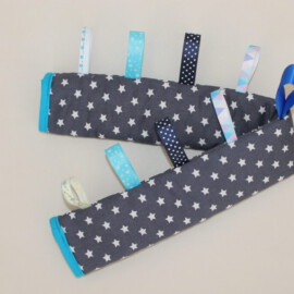 Bumper bar cover with tags ,stars print on a gray