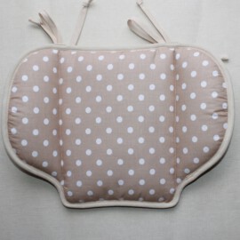 Small pillow for a stroller , dots print on a beige