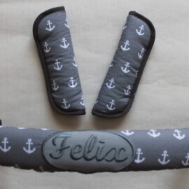 Bumper bar cover & shoulder pads, anchors on a gray background ,with name