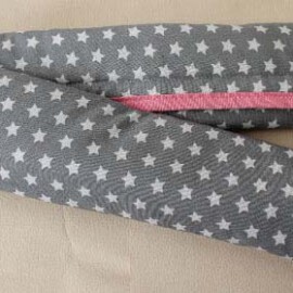 Bumper bar cover ,stars print on a gray / pink