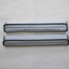 Handlebar covers , dots print on a gray