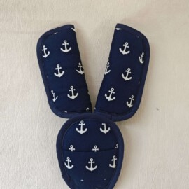 Shoulder Pads & Croth Cover "anchors on a blue "